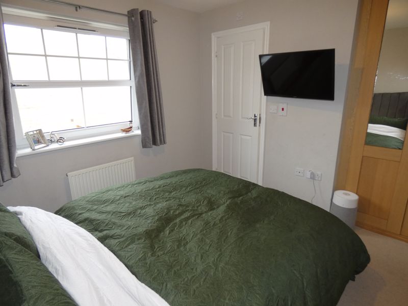 Bedroom One- click for photo gallery